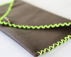 用牛皮布制作的精美创意手工DIY个性手拿包教程 