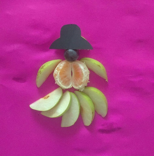 有趣的手工DIY水果拼贴画之戴黑帽子的苹果姑娘